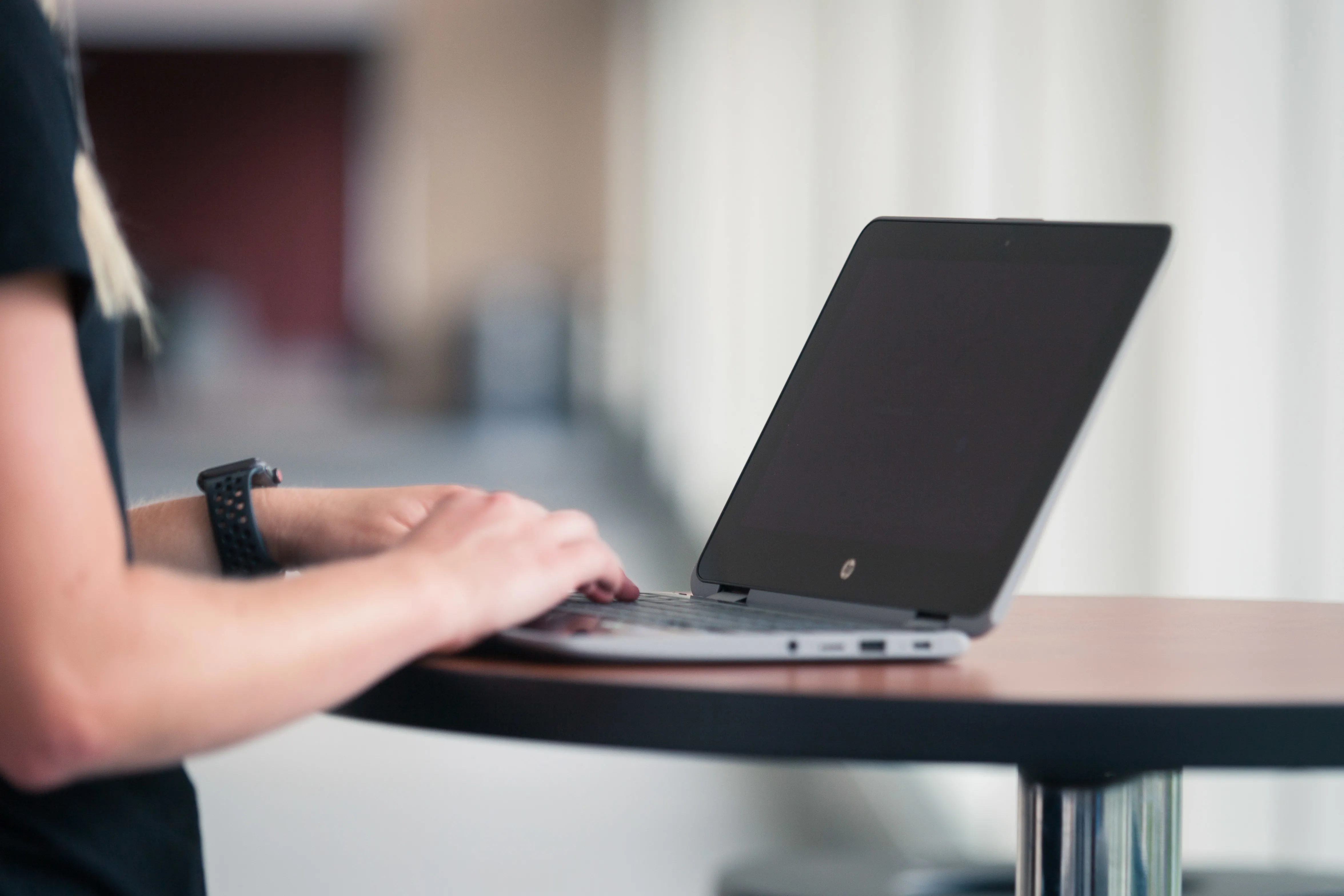 student working on their laptop